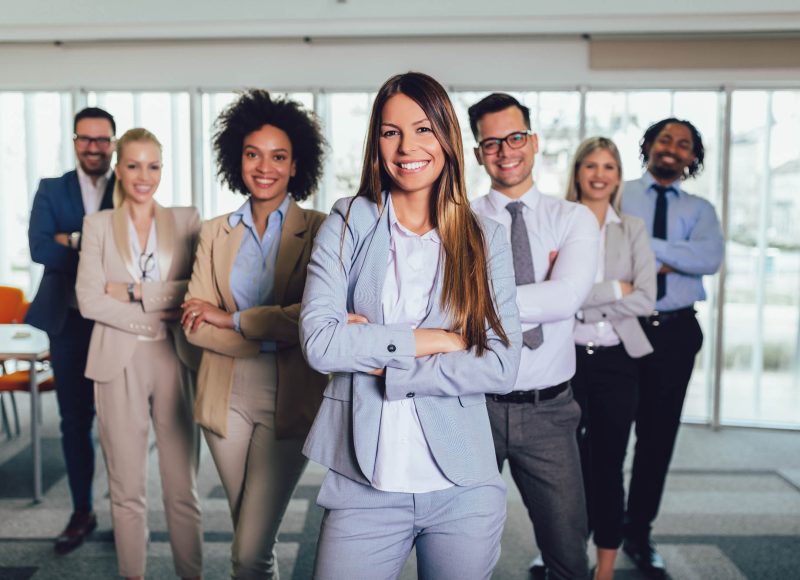 Group of happy business people and company staff in modern offic